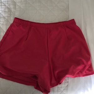 Pink Nike tennis shorts